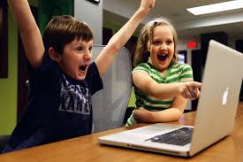 Young students working on laptop